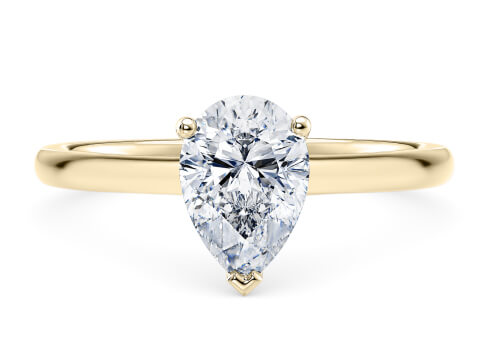 Paloma in Yellow Gold set with a Pear cut diamond.