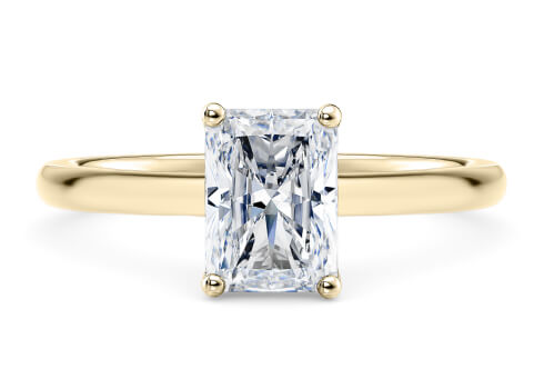 Paloma in Yellow Gold set with a Radiant cut diamond.