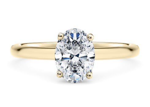 Paloma in Yellow Gold set with a Oval cut diamond.