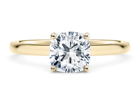 Paloma in Yellow Gold set with a Cushion cut diamond.