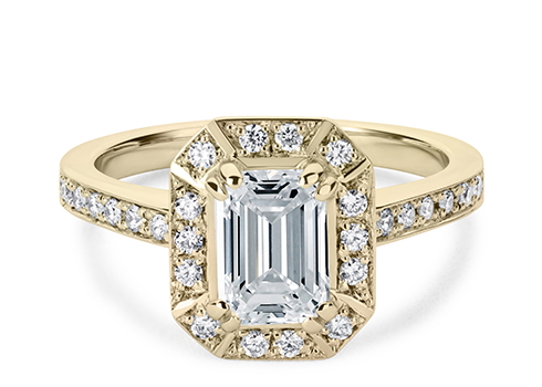 Zelda in Yellow Gold set with a Emerald cut diamond.