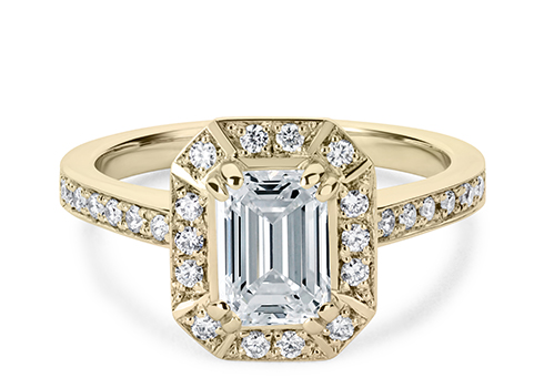 Zelda in Yellow Gold set with a Emerald cut diamond.