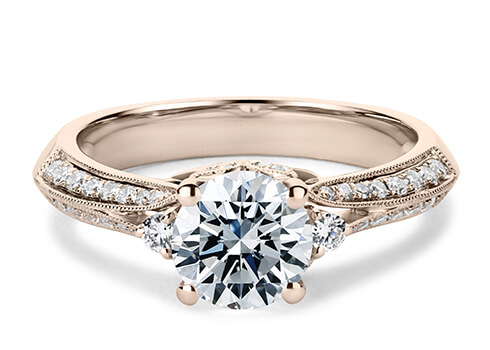 Dauphin in Rose Gold set with a Round cut diamond.