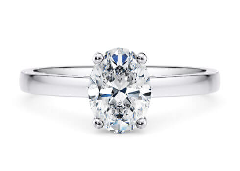 1477 Classic in Platino set with a Oval cut diamante.