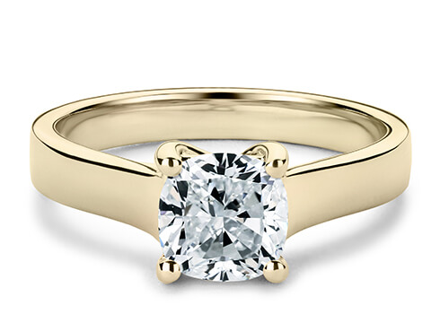 Ballerina in Yellow Gold set with a Cushion cut diamond.