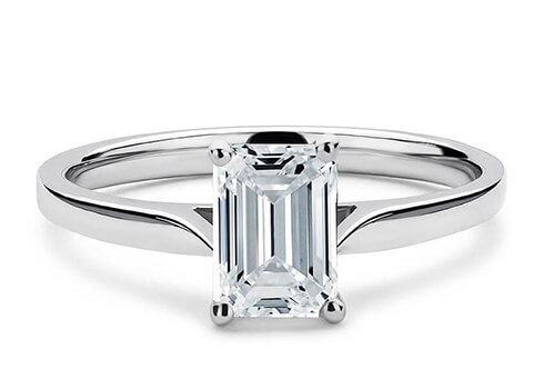 Contour in White Gold set with a Emerald cut diamond.