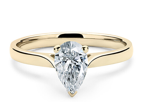 Contour in Yellow Gold set with a Pear cut diamond.