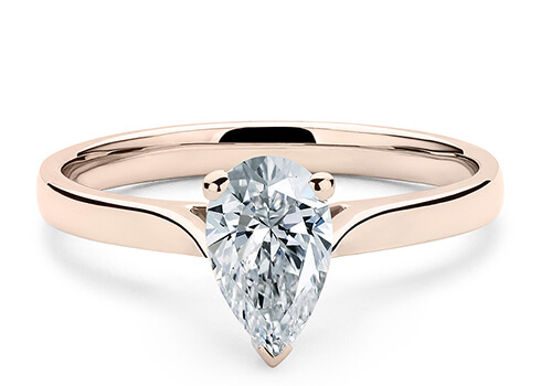 Contour in Rose Gold set with a Pear cut diamond.