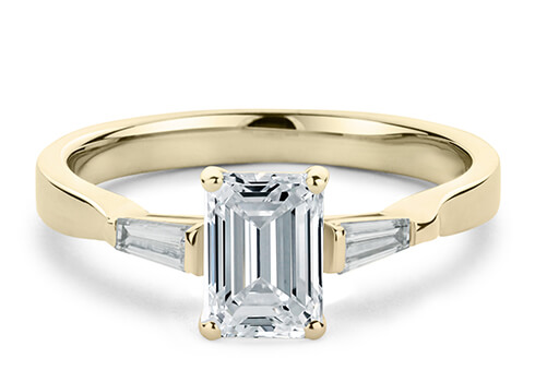Cairo in Yellow Gold set with a Emerald cut diamond.