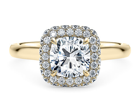 Cassia in Yellow Gold set with a Cushion cut diamond.