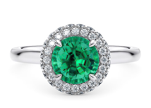 Cassia in White Gold set with a Round cut Emerald.
