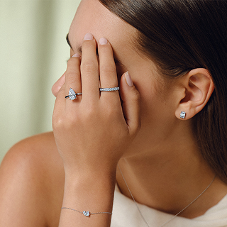 Woman wearing diamond engagement rings